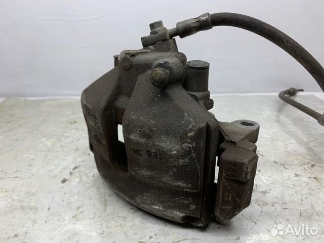 Суппорт передний левый Volkswagen Passat Cc 2.0