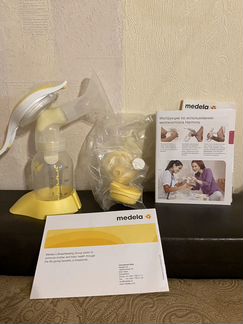 Молокоотсос ручной фирма Medela