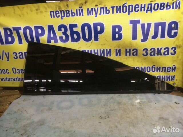 Стекло заднее левое Opel Astra H