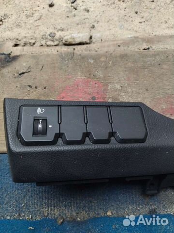 Кнопки корректора фар и подогрева лобового стекла
