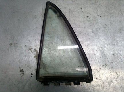 Стекло двери заднее левое Toyota Corolla E12 1.4