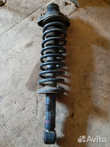 Амортизатор стойка задний Mitsubishi Outlander CU