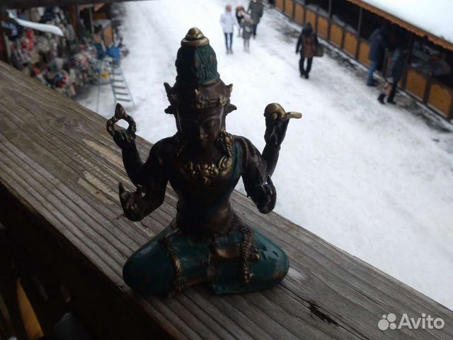 Буда четырехрукий