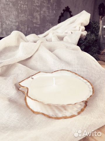 Свеча в раковине морского гребешка