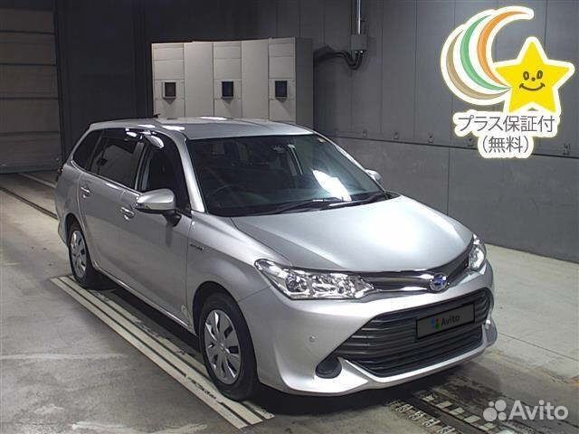 80097 22.10.2022 USS Kyushu Toyota Corolla Fielder 2015 жемчужный nke165g HV G Aero Tourer at 1500 cc ff74 60000 km 4