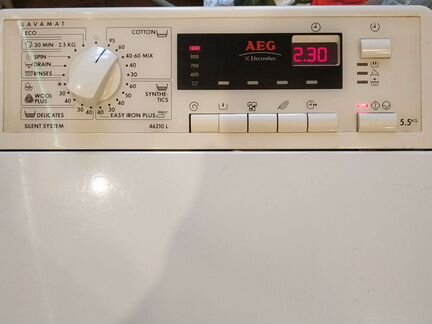 AEG с вертикальной загрузкой 5.5 кг 1200 об