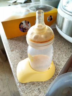 Молокоотсос Medela swing