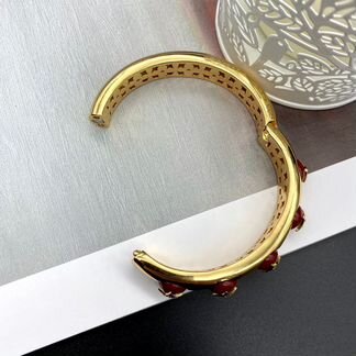 Браслет Louis Vuitton с бордовыми камнями