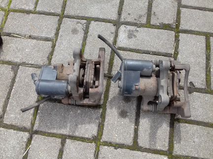 Volkswagen Passat CC суппорт задний левый в сборе