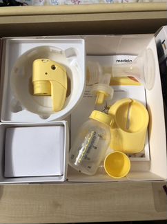 Молокоотсос medela электрический